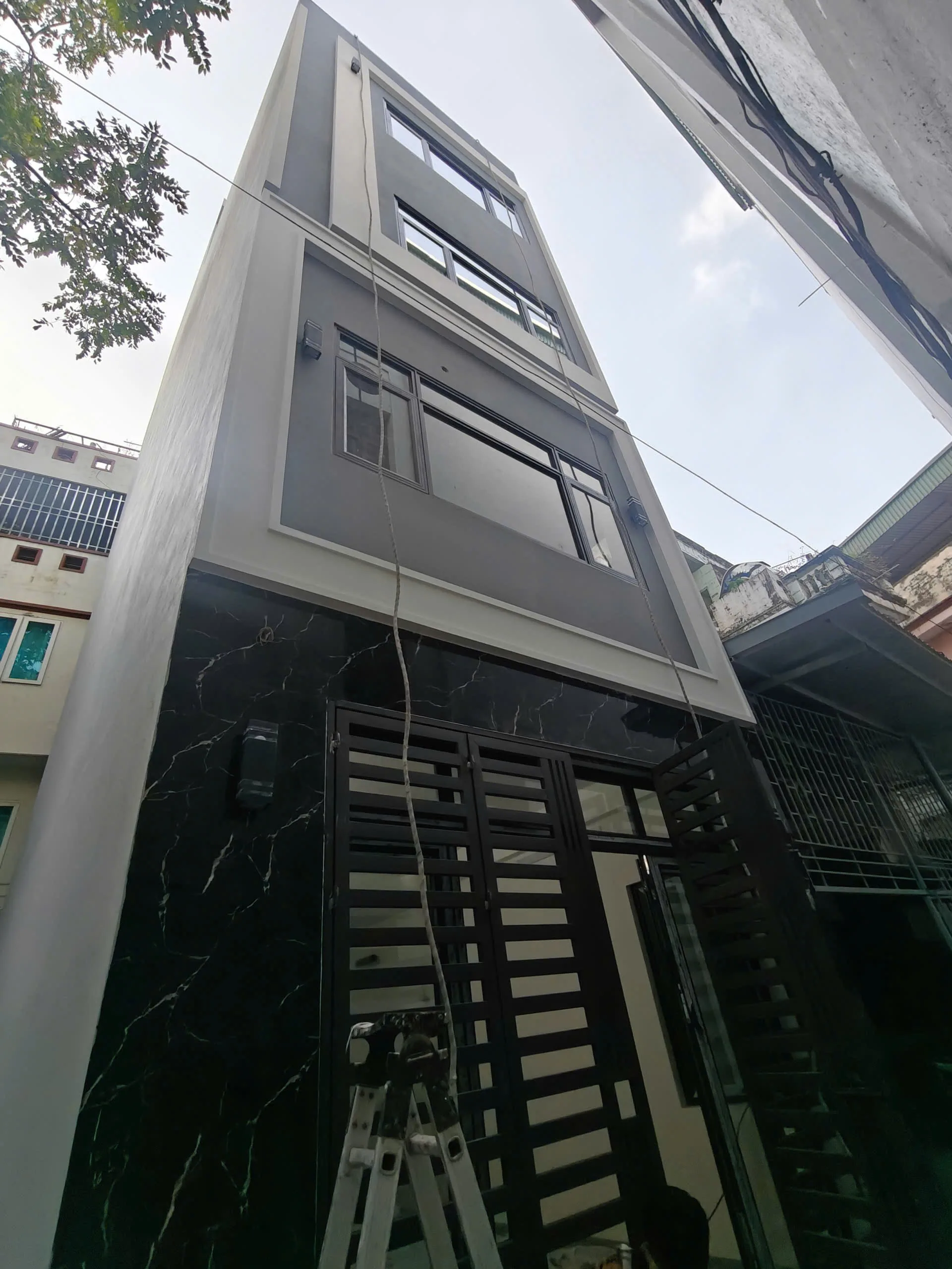 thi công trọn gói nhà 4 tầng 1 tum mái bằng