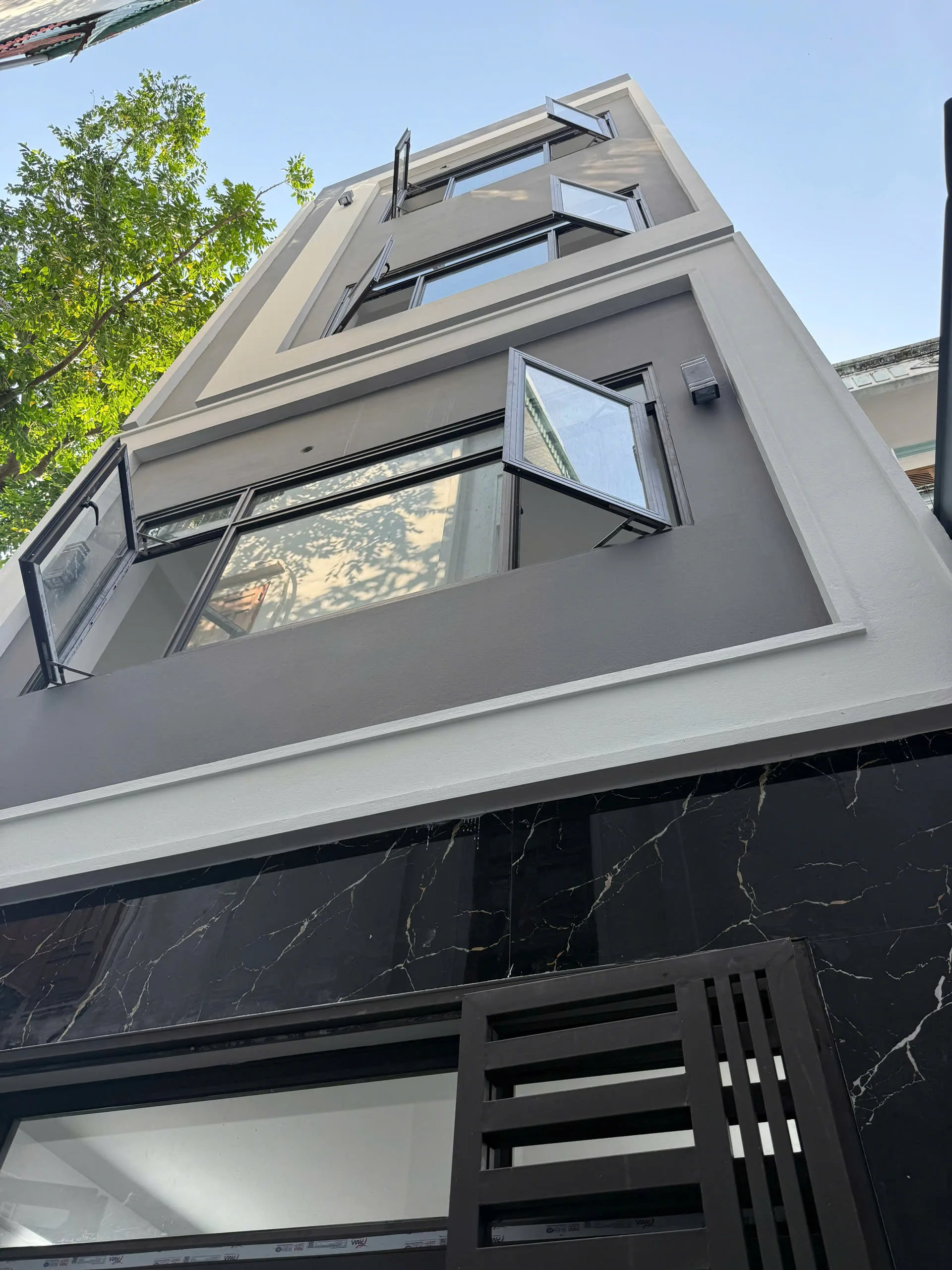 thi công trọn gói nhà 4 tầng 1 tum mái bằng