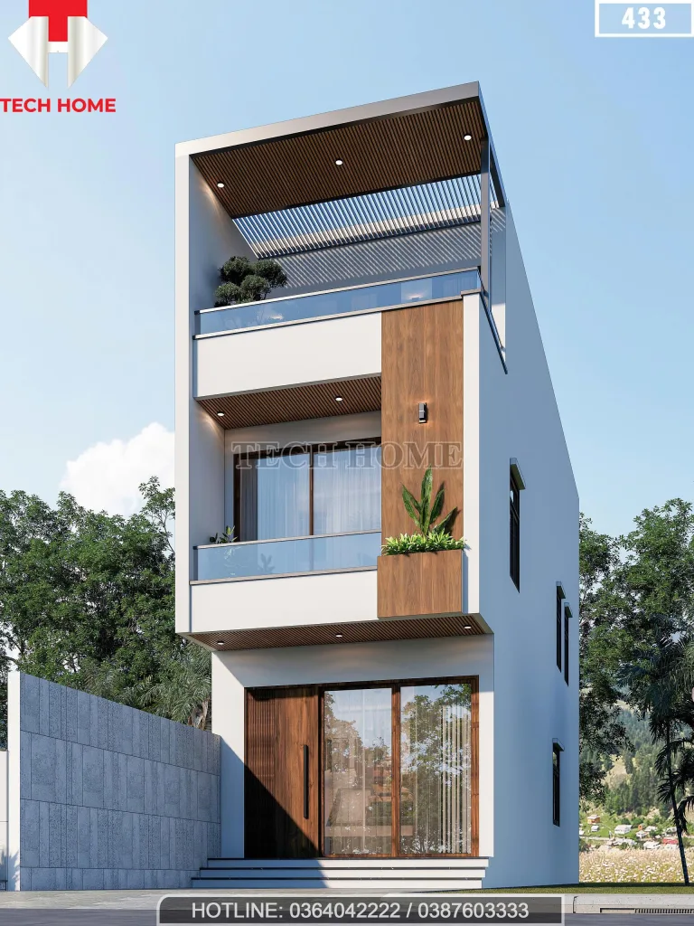 Góc nghiêng mẫu thiết kế nhà ống 3 tầng với hệ lan can kính và lam gỗ trang trí đẹp mắt.