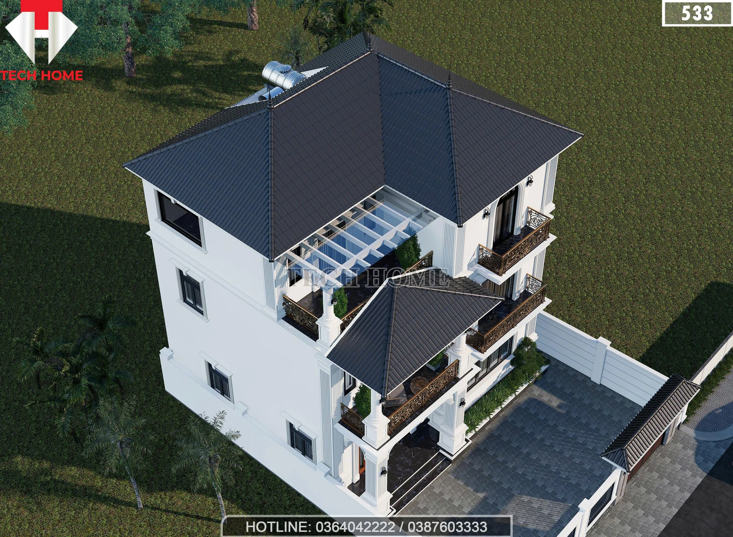 Tổng thể mẫu nhà 2 tầng 1 tum mái Nhật lợp ngói màu xanh than có sân chơi rộng rãi trên tầng tum.