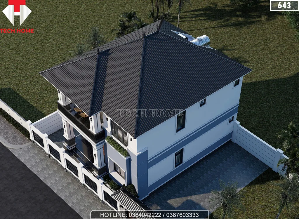 Tổng thể mẫu nhà 2 tầng mái Nhật lợp ngói màu xanh ghi sang trọng và bề thế.
