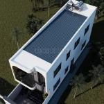 Góc nhìn từ trên cao mẫu nhà phố 2 tầng 5x15m sử dụng mái tôn chống nóng và hệ thống năng lượng mặt trời.