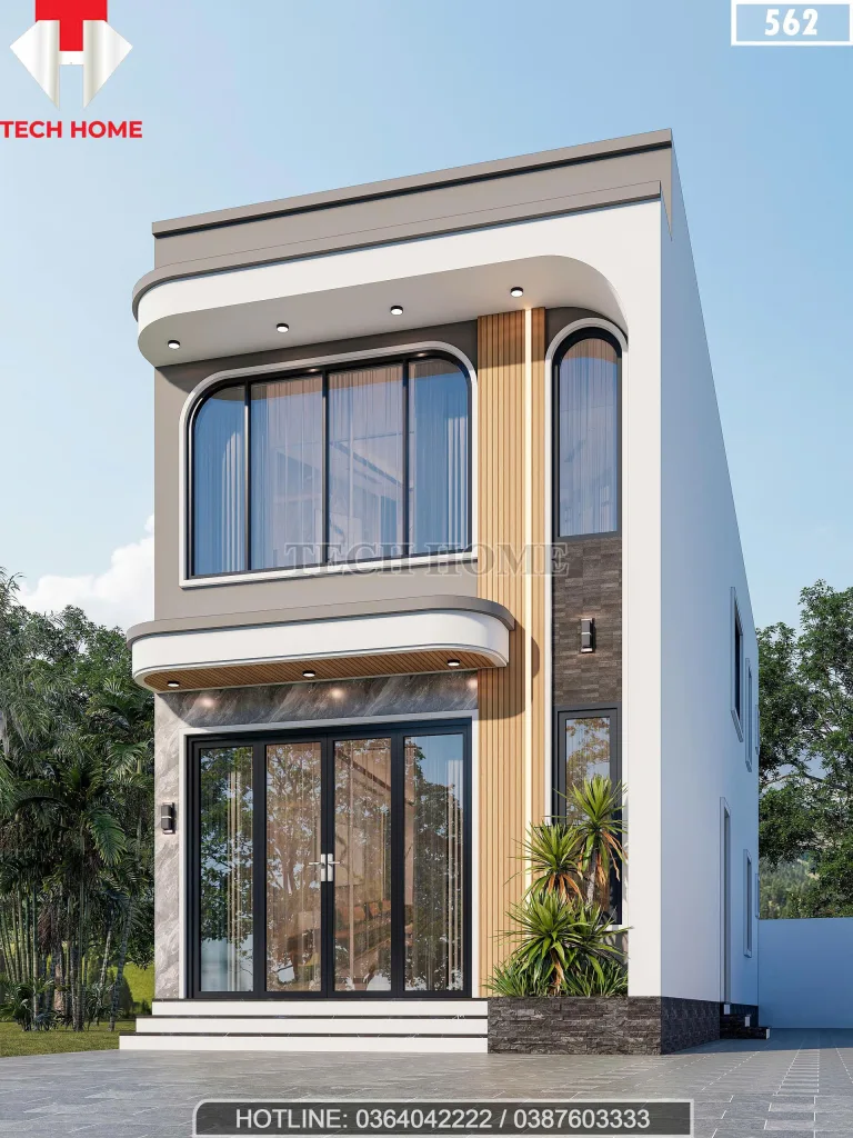 Góc nghiêng mẫu nhà ống 2 tầng đẹp phong cách hiện đại với thiết kế ban công bo cong mềm mại.