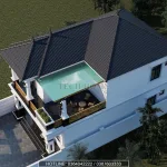 Tổng thể mẫu nhà mái Nhật 2 tầng lợp ngói xanh than có sân chơi và mái kính nghệ thuật đẹp mắt.