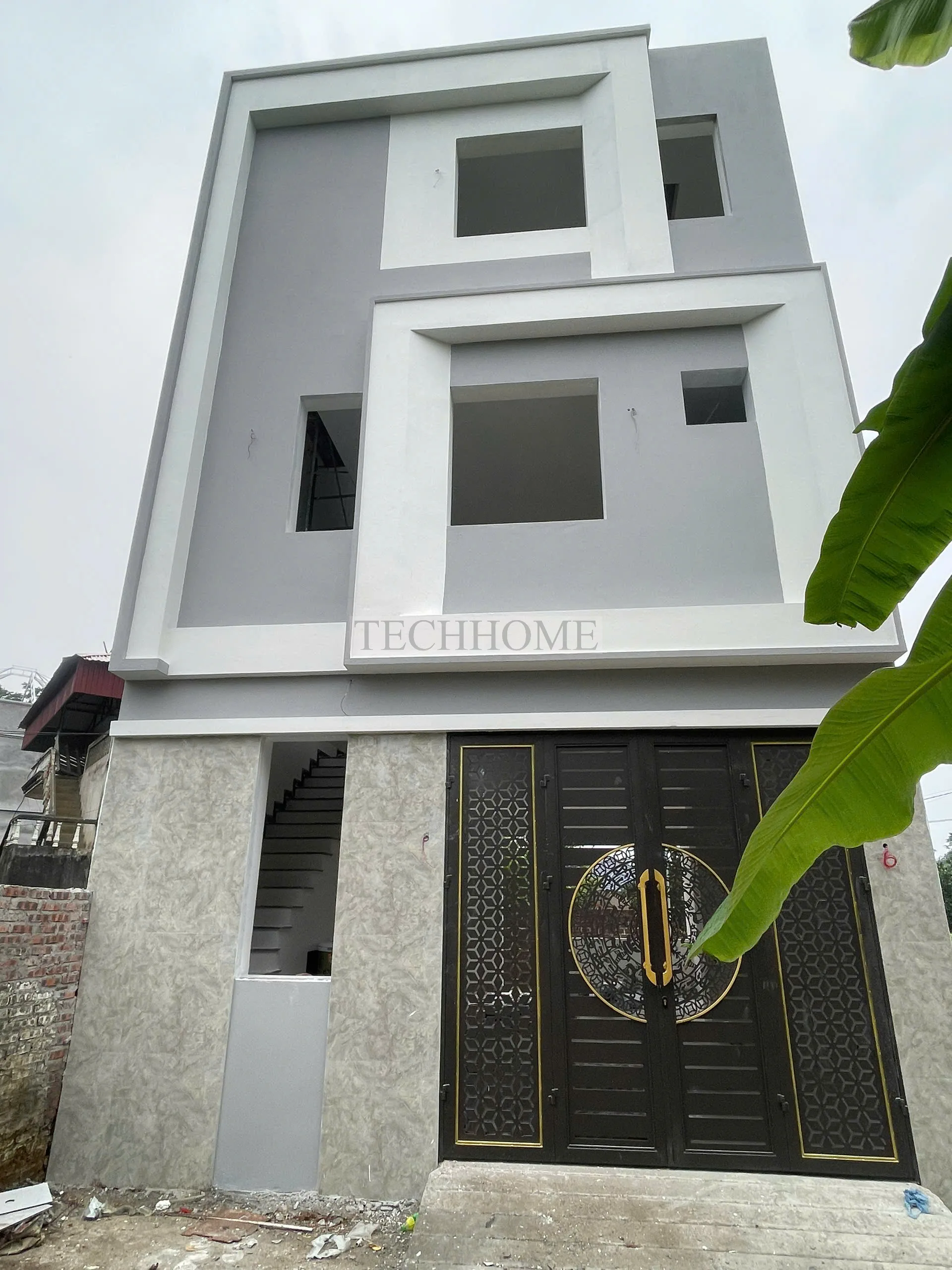 Hoàn thiện mặt tiền mẫu nhà phố 3 tầng hiện đại xây nhà trọn gói tại Thạch Thất.