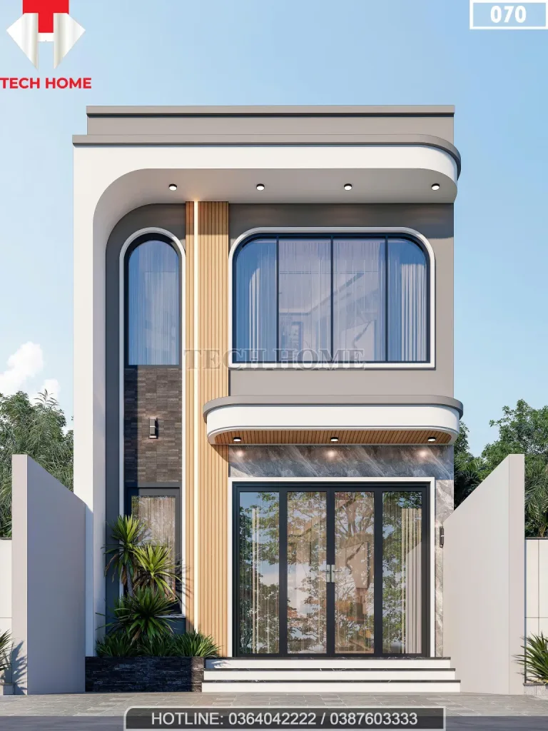 Thiết kế nhà gác lửng bề thế như mẫu nhà mái bằng 2 tầng với hệ cửa kính vòm cao kịch trần.