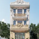 Mẫu nhà phố 3 tầng mái bằng phong cách tân cổ điển kiểu Pháp bề thế với tầng 1 ốp đá màu vàng hoàng gia lộng lẫy.